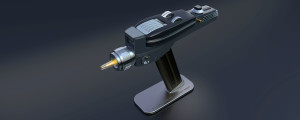 Phaser displayed on magnetic stand with tip glowing yellow