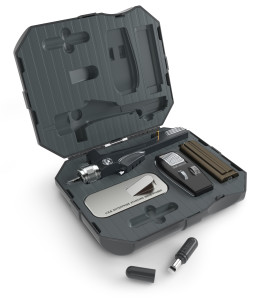 The Phaser in its foam-lined transit case (the USB charging cable is stored under the stand)